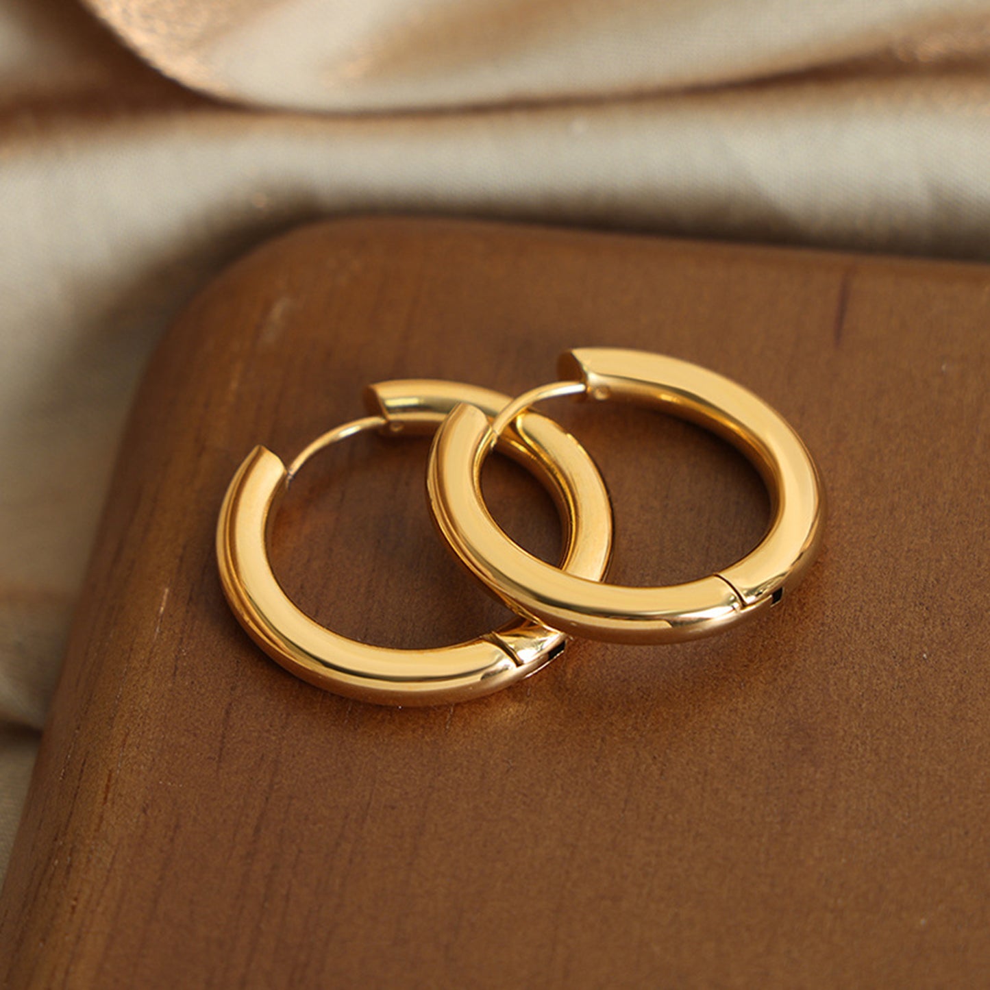 All You Need Huggie Earrings in 18k Gold